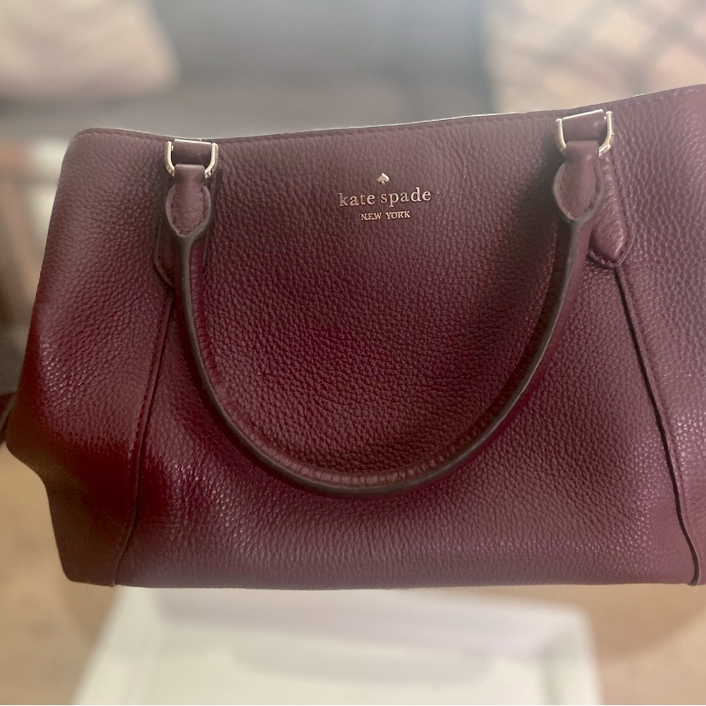 Kate Spade Maroon Handbag, clutch or crossbody with adjustable strap.